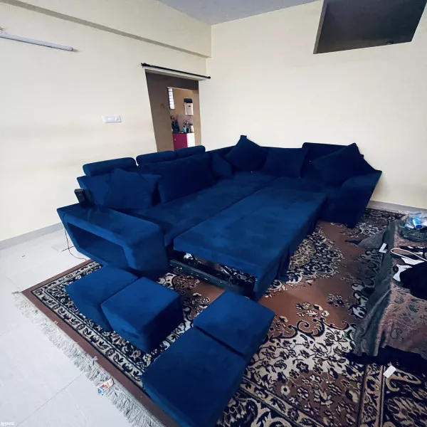 7 Sweater Sofa Cum Bed + 4 Seating Puffies + 6 Cushions for rent