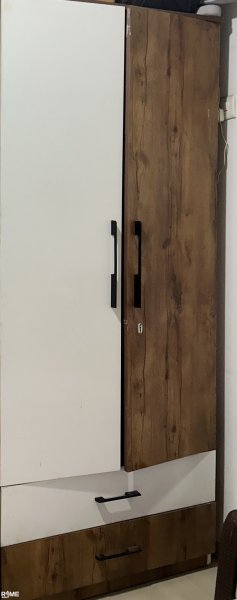 Two door wardrobe made of enginerred wood.. looks sturdy and strong on rent